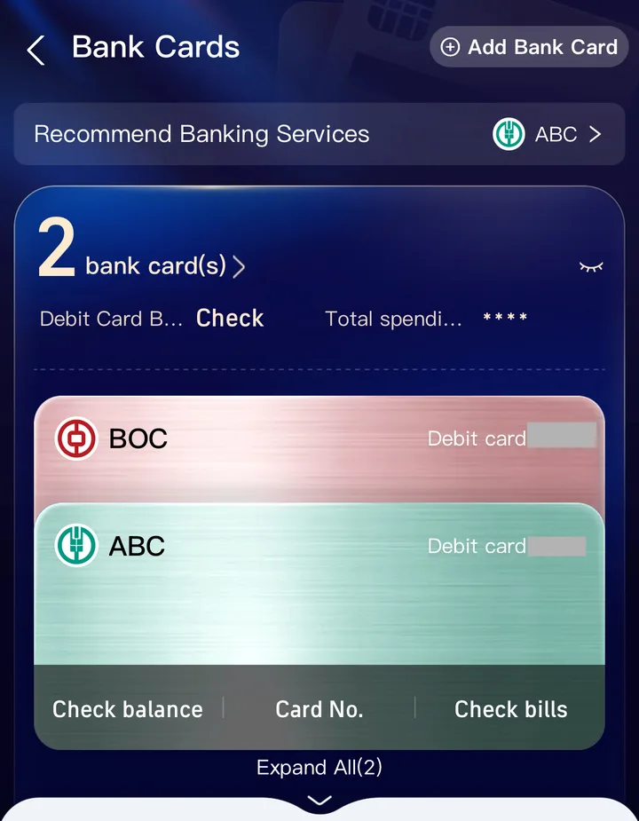 Alipay Bank Cards page with two linked bank cards (card numbers hidden) and the Add Bank Card button