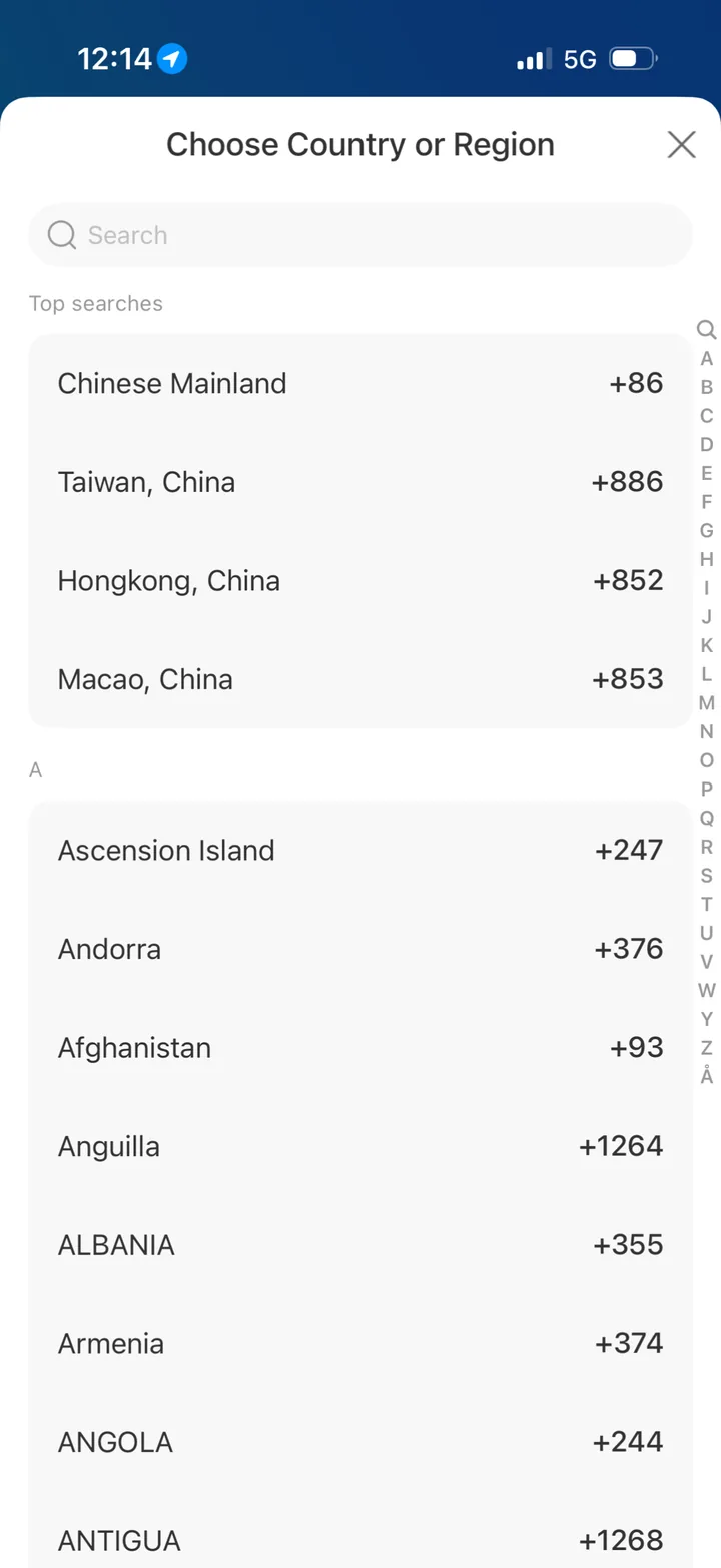 Alipay Choose Country or Region list showing +86, +886, +852 and +853 at the top, then countries from Ascension Island to Antigua