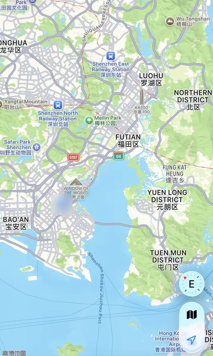 Phone map of Shenzhen and the northern edge of Hong Kong, showing Luohu and Futian along the border, Window of the World in Nanshan, and Shenzhen Bay