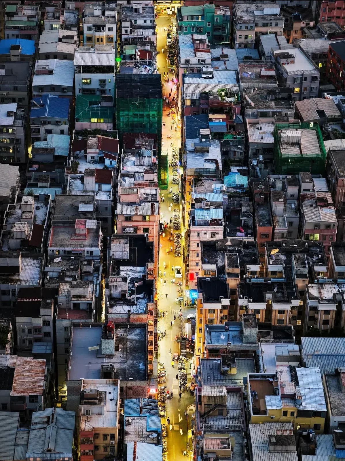 Urban village street in Shenzhen at dusk, seen from above