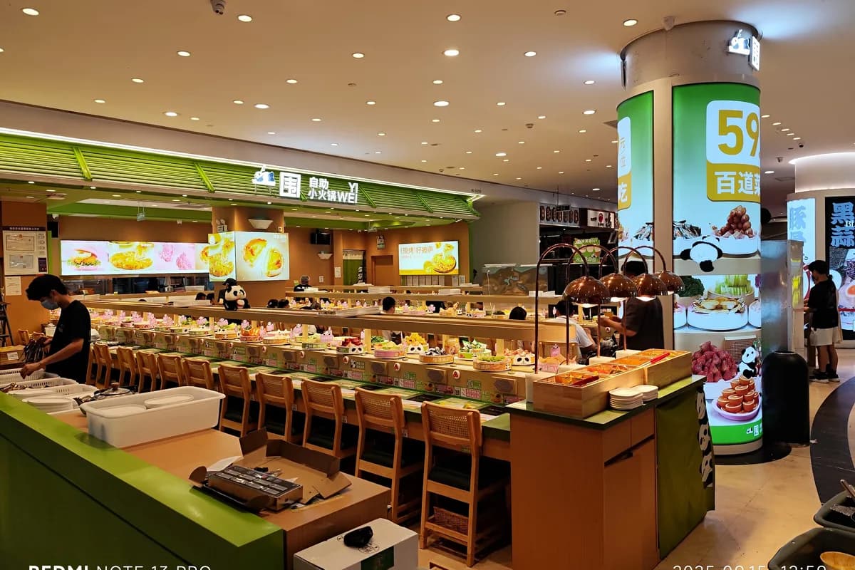 Hot pot buffet counter inside a Futian mall restaurant in Shenzhen
